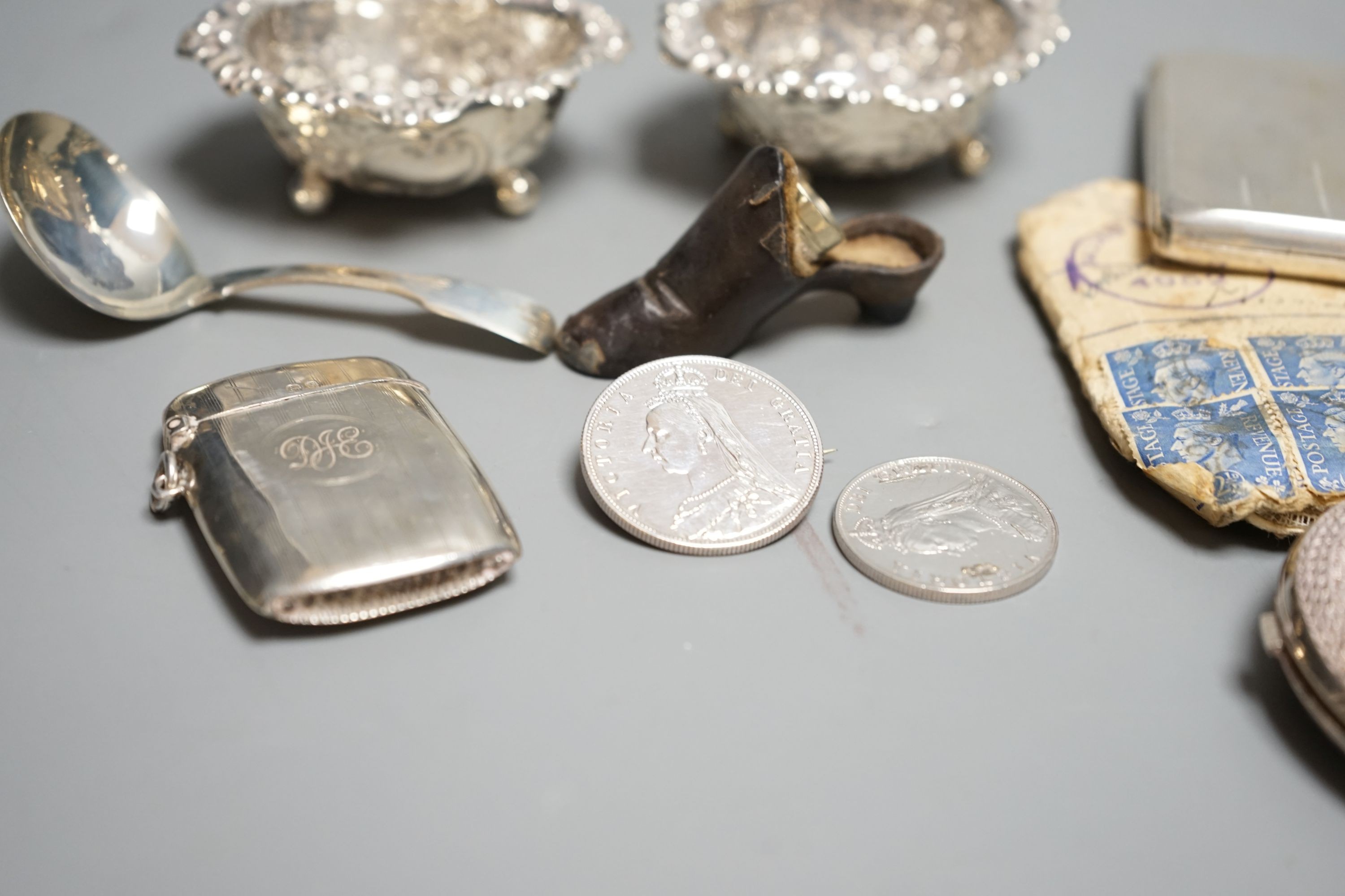 A silver cigarette case, Georgian silver caddy spoon, London, 1817, a pair of silver salts, etc.